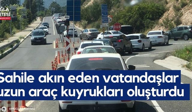 Muğla'da sahile akın eden vatandaşlar uzun araç kuyrukları oluşturdu