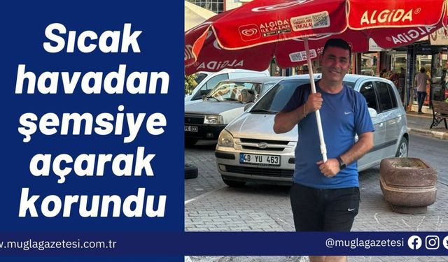 Sıcak havadan şemsiye açarak korundu